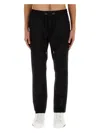 Dolce & Gabbana Jogging Pants With Plaque Detail