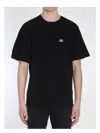 Dolce & Gabbana Cotton T-shirt With Metal Plaque Featuring Front Logo In Black