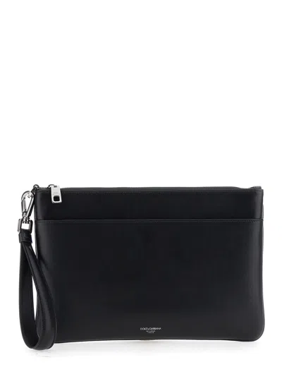 DOLCE & GABBANA DOLCE & GABBANA MEN BLACK CLUTCH WITH REMOVABLE WRIST STRAP AND LOGO LETTERING ON THE FRONT IN LEATH
