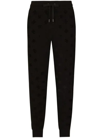 Dolce & Gabbana Monogram-embossed Cotton Track Pants In Black