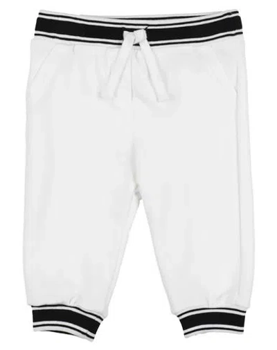 Dolce & Gabbana Babies'  Newborn Boy Pants Ivory Size 3 Cotton, Elastane In White