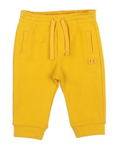 Dolce & Gabbana Babies'  Newborn Boy Pants Yellow Size 3 Cotton, Elastane, Viscose