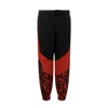 Dolce & Gabbana Jogging Pants With Animal Print In Black