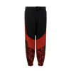 Dolce & Gabbana Jogging Pants With Animal Print In Black