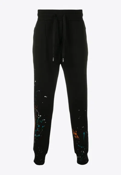 Dolce & Gabbana Paint Splatter Track Pants In Black