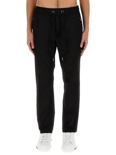 DOLCE & GABBANA DOLCE & GABBANA PANTALONE JOGGING CON PLACCA