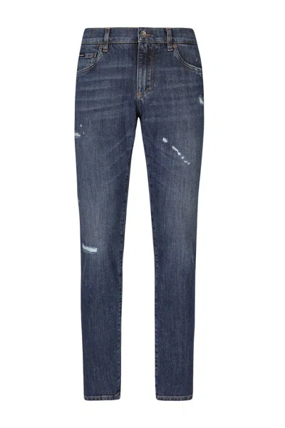 Dolce & Gabbana Logo Plaque Distressed Slim Jeans In Blue