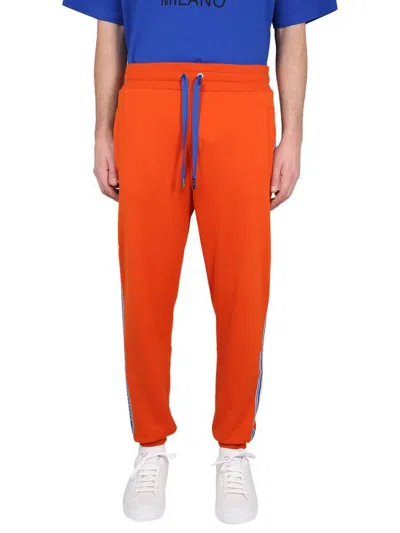 Dolce & Gabbana Trousers With Logoed Band In Orange