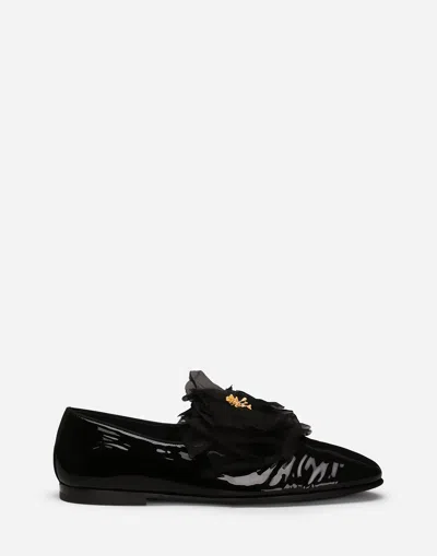 DOLCE & GABBANA PATENT LEATHER SLIPPERS WITH FLOWER APPLIQUÉ