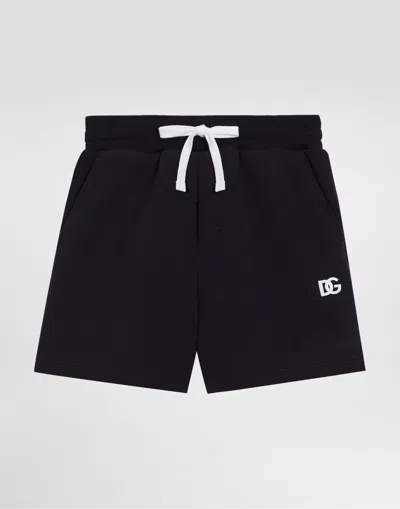Dolce & Gabbana Piqué Shorts With Dg Logo In Blu Scurissimo 1