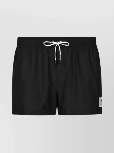 DOLCE & GABBANA PRINTED SWIM TRUNKS WITH MID-LENGTH AND LOGO