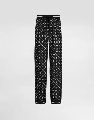 Dolce & Gabbana Printed Twill Trousers In Black