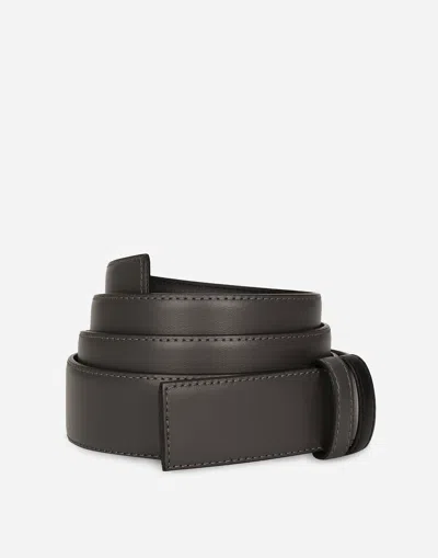 Dolce & Gabbana Reversible Calfskin Belt Strap In Black