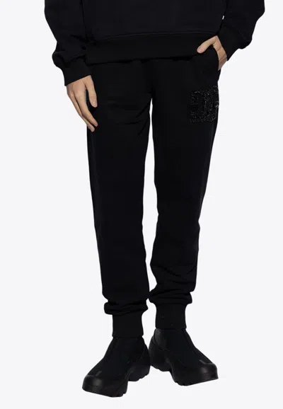 Dolce & Gabbana Rhinestone Dg Logo Track Pants In Black