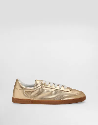 Dolce & Gabbana Saint Tropez Foiled Leather Trainers In Gold