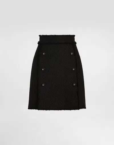 Dolce & Gabbana Short Raschel Tweed Skirt With Decorative Dg Logo Buttons In Black