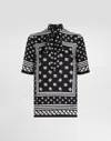Dolce & Gabbana Short-sleeved Silk Blouse With Pussy-bow And All-over Dg Logo Scarf Print In Black
