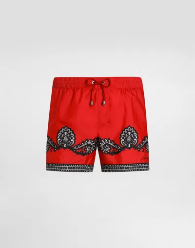 DOLCE & GABBANA SHORT SWIM TRUNKS WITH BANDANNA PRINT