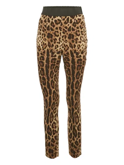 Pre-owned Dolce & Gabbana Silk Animal-print Trousers In Brown