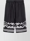 Dolce & Gabbana Black Bermuda Pants With Drawstring Elastic Waist And Maxi Print In Silk Man