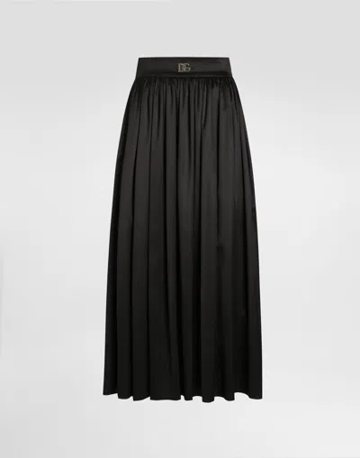 Dolce & Gabbana Skirt With Metal Logo In Black