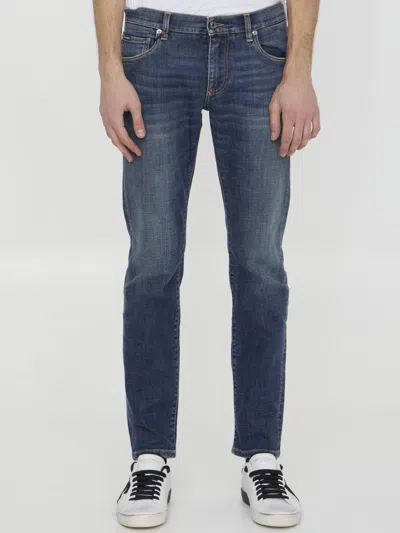 Dolce & Gabbana Washed Slim Fit Stretch Denim Jeans In Medium Wash