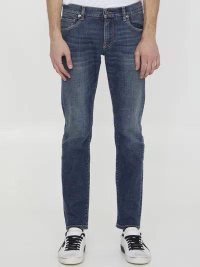 Dolce & Gabbana Washed Slim Fit Stretch Denim Jeans In Light Blue