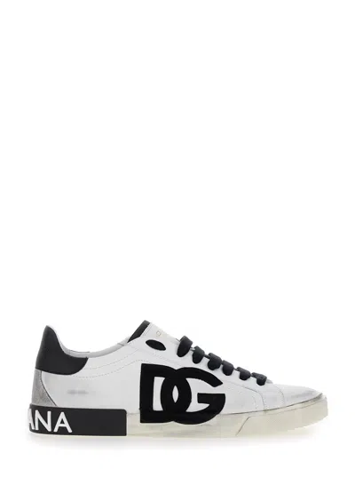 DOLCE & GABBANA PORTOFINO WHITE AND BLACK LOW TOP SNEAKERS WITH LOGO PATCH AND USED EFFECT IN LEATHER MAN