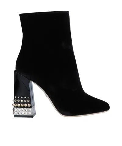Dolce & Gabbana Solid Color Ankle Boots In Black
