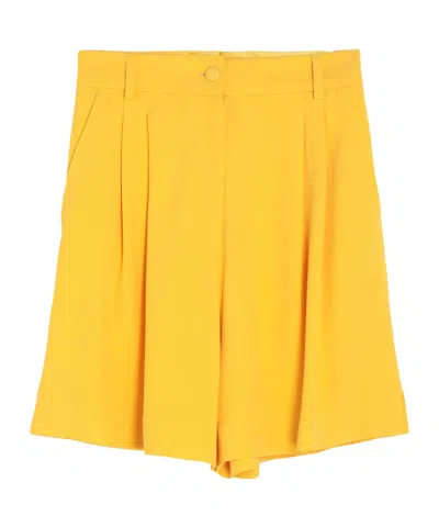 Dolce & Gabbana Solid Color Shorts In Yellow