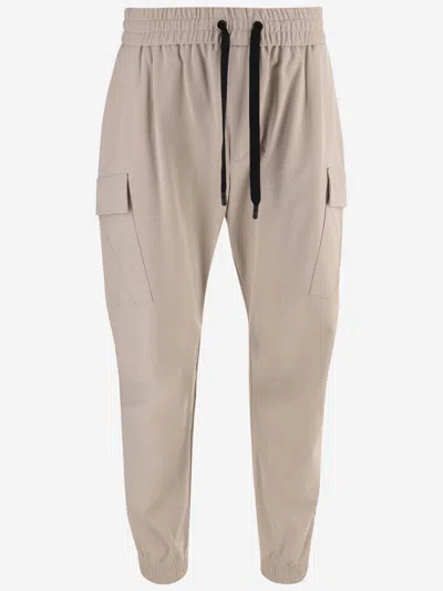 Dolce & Gabbana Stretch Cotton Cargo Pants With Dg Plaque In Beige