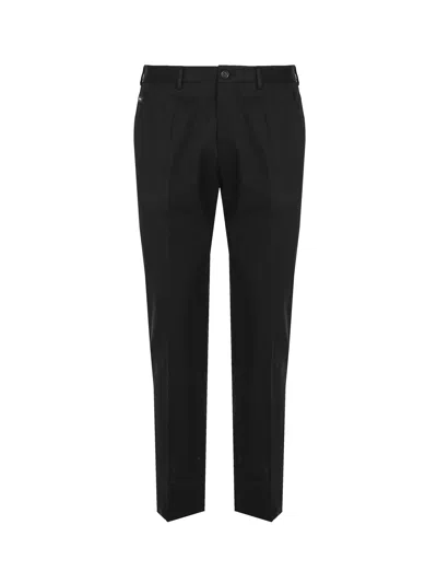DOLCE & GABBANA STRETCH COTTON TROUSERS WITH LOGOED PLAQUE