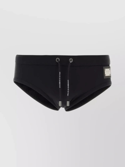 DOLCE & GABBANA STRETCH NYLON SWIMMING BRIEF WITH METALLIC ACCENTS