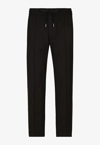 DOLCE & GABBANA STRETCH WOOL-BLEND TRACK PANTS