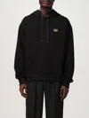 Dolce & Gabbana Logo Tag Embellished Hooded Sweatshirt In Black