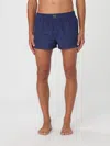 Dolce & Gabbana Short Swim Trunks With Logo Plaque In Blue