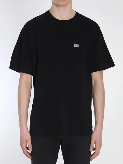 DOLCE & GABBANA T-SHIRT WITH PLAQUE