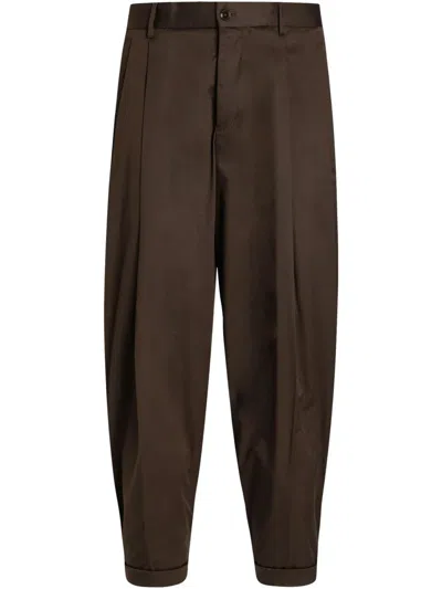 Dolce & Gabbana Tapered Pleated Cotton-blend Gabardine Trousers In Brown