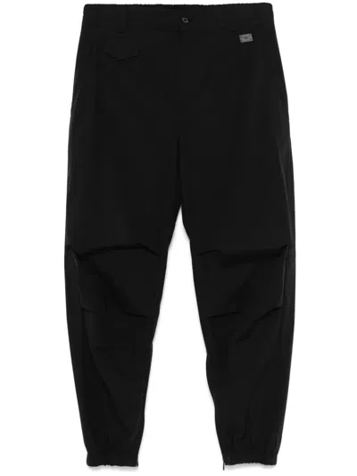 DOLCE & GABBANA DOLCE & GABBANA TAPERED TROUSERS WITH LOGO PLAQUE