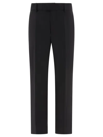 DOLCE & GABBANA TECHNICAL FABRIC PANTS WITH METAL DG LOGO TROUSERS BLACK