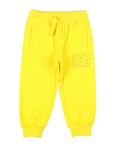Dolce & Gabbana Babies'  Toddler Boy Pants Yellow Size 5 Cotton, Elastane, Polyurethane, Polyester