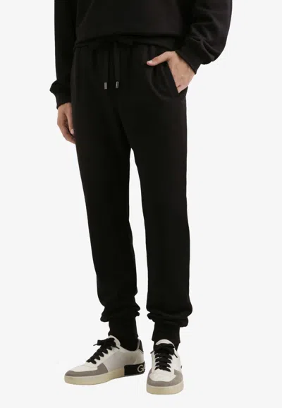 Dolce & Gabbana Track Pants With Logo-patch In Black