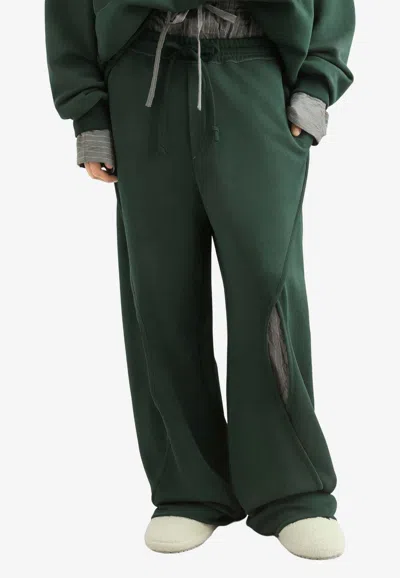 Dolce & Gabbana Treated Cut-out Track Pants In Green