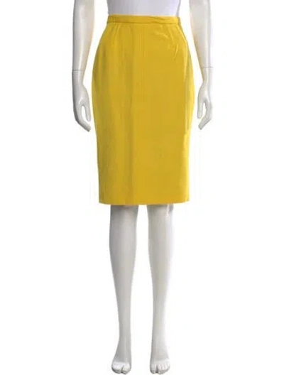 Pre-owned Dolce & Gabbana Virgin Wool Knee-length Skirt In Yellow