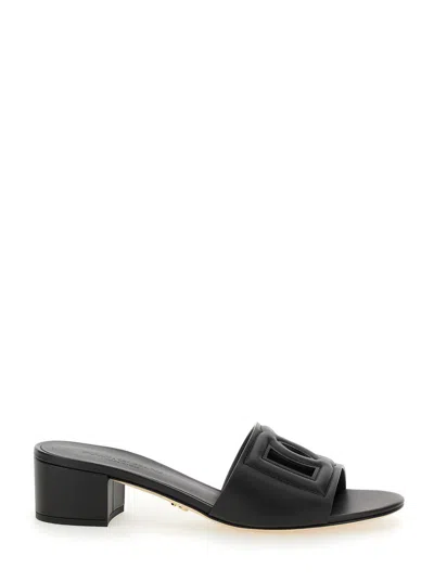 DOLCE & GABBANA DOLCE & GABBANA WOMEN BLACK SLIDES WITH LOW HEEL AND LOGO DG  IN SMOOTH LEATHER WOMAN