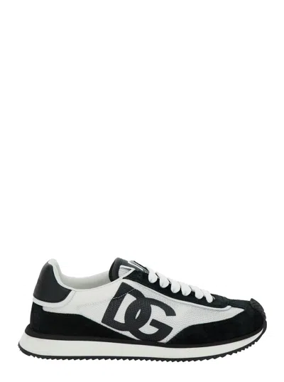 DOLCE & GABBANA DOLCE & GABBANA WOMEN 'DG CUSHION' WHITE AND BLACK LOW TOP SNEAKERS WITH LOGO PRINT IN MIXED MATERIA