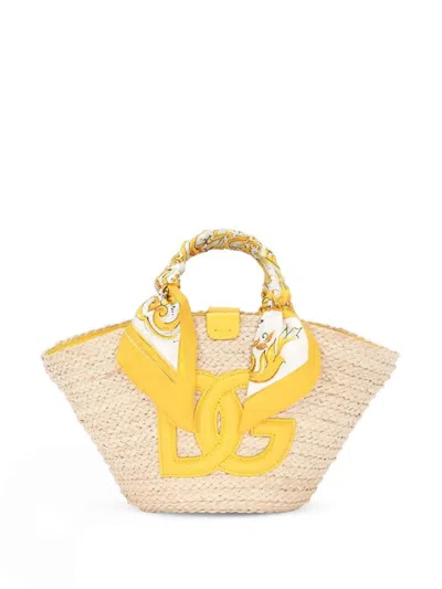 Dolce & Gabbana Interwoven Straw Bucket Handbag With Wrapped Handles In Yellow