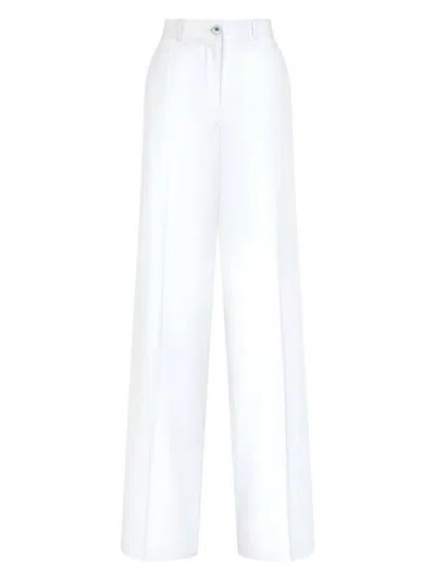 Dolce & Gabbana Flared Cotton Gabardine Pants In ホワイト