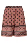 Dolce & Gabbana Pink Bermuda Shorts With Dg Logo Printed All-over In Silk Woman In Pink
