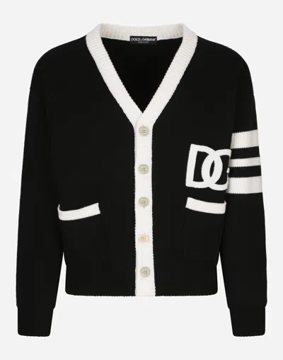 DOLCE & GABBANA WOOL FISHERMAN’S RIB CARDIGAN WITH DG LOGO